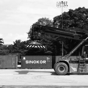 Container handler moving a sinokor shipping container