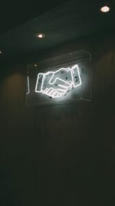 Human hand neon signage