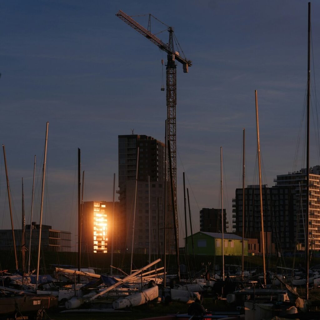 A harbor filled with lots of boats and tall buildings