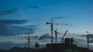 Several cranes above the buildings
