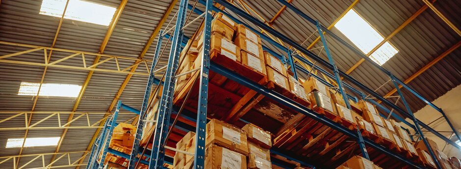 A large stack of boxes in a warehouse