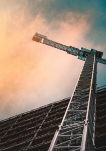 Low angle photography of gray tower crane