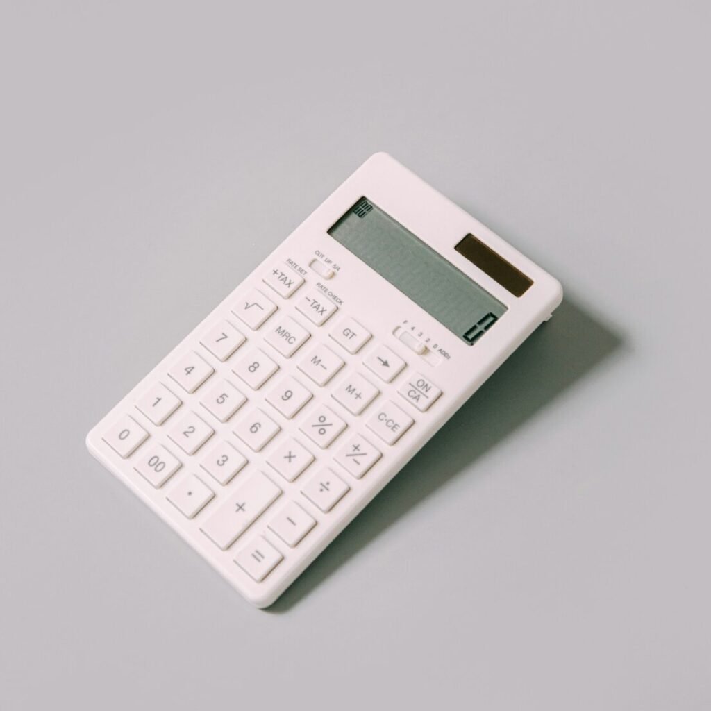 White calculator on white table