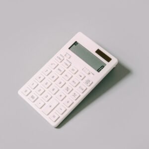 White calculator on white table