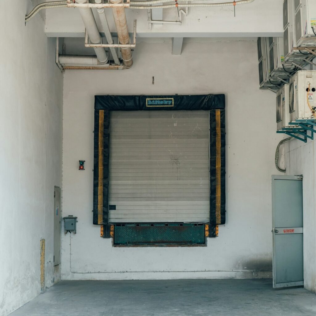 A garage with a closed door and a closed door