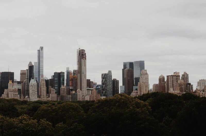 Grey and brown building under grey sky