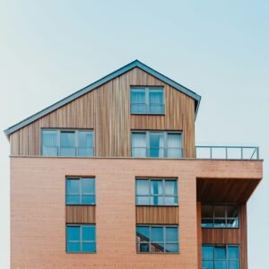 Low-angle photo of brown house