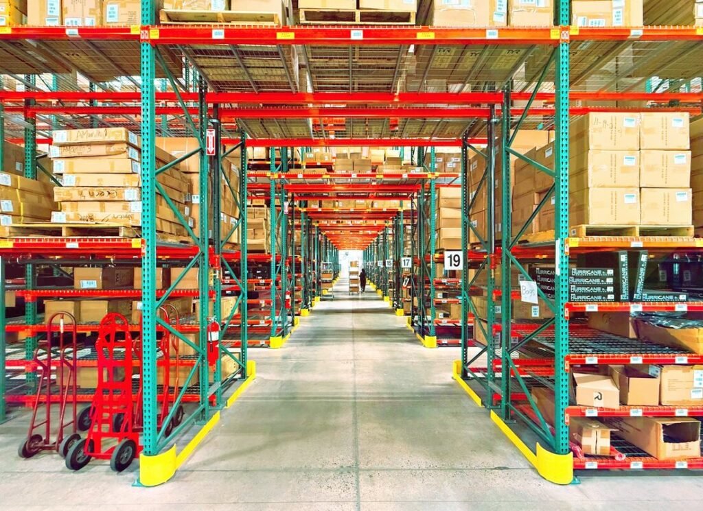A warehouse is filled with shelves and boxes