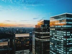 Birds-eye view of cityscape under blue sky
