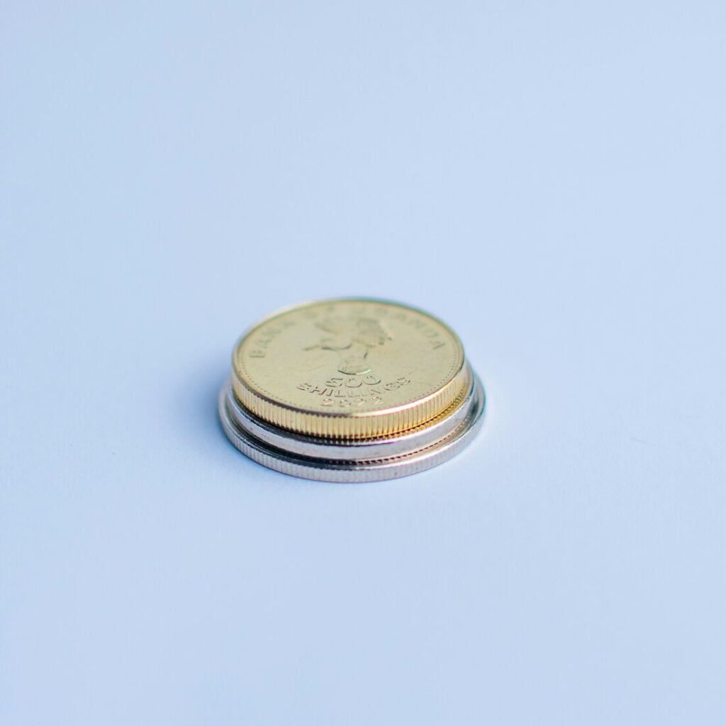 A small stack of coins sits isolated