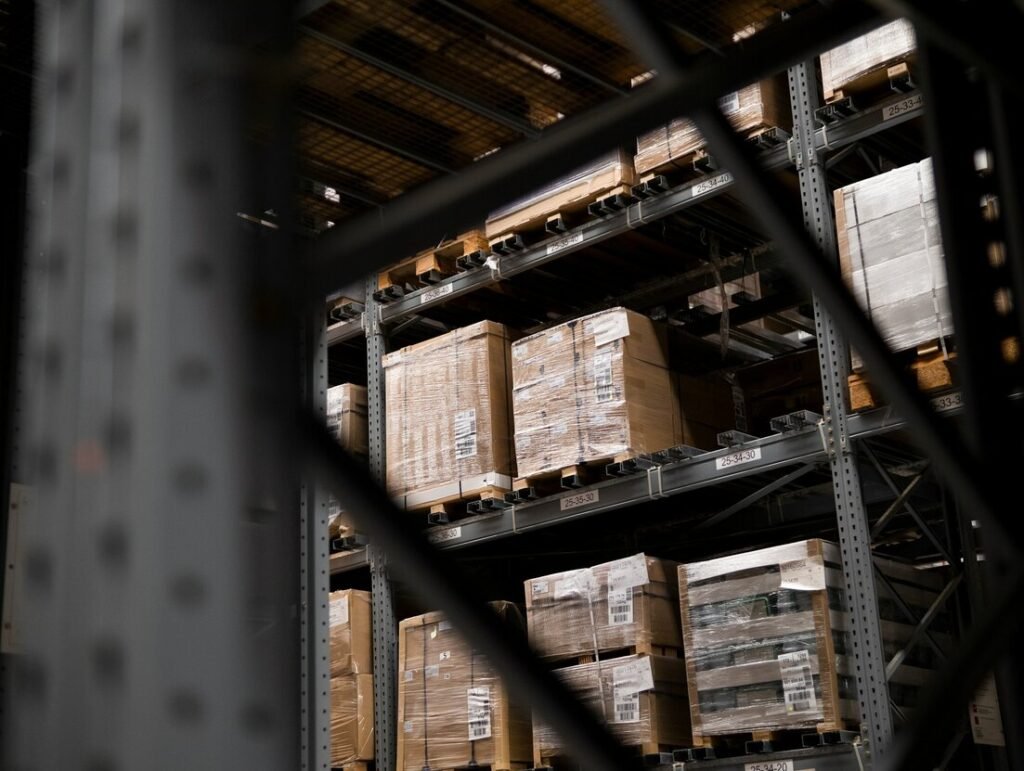 A warehouse filled with lots of boxes and pallets