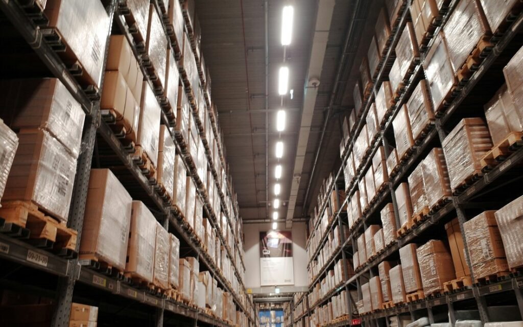 A large warehouse filled with lots of boxes