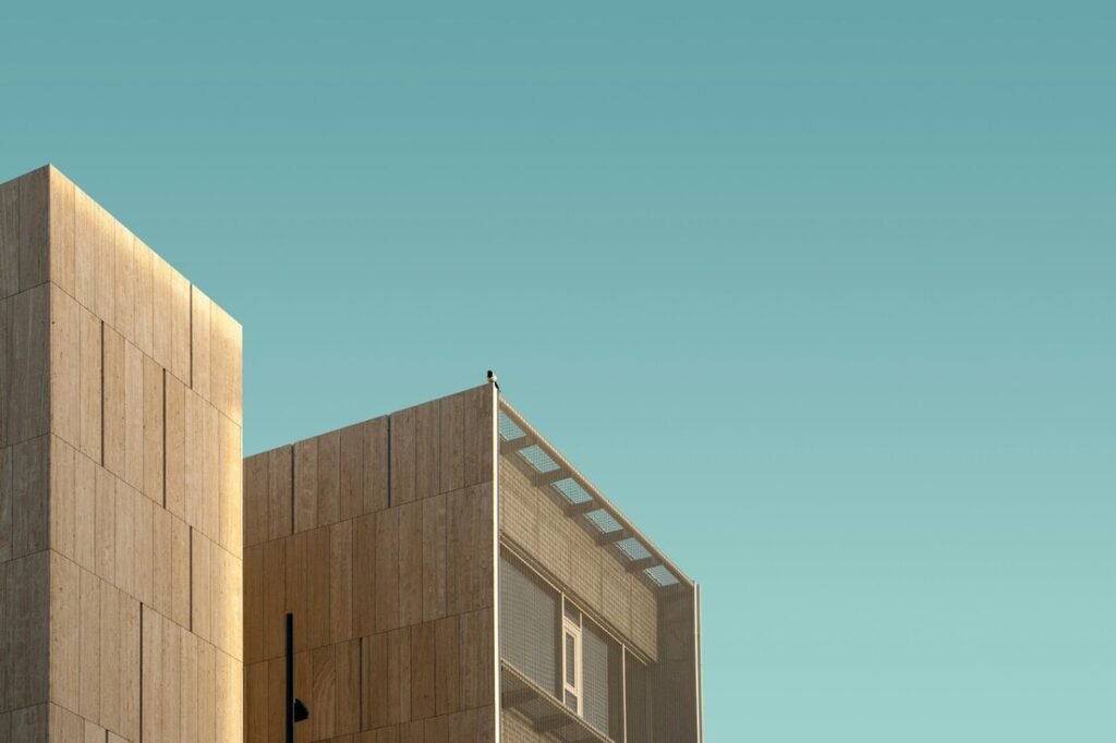 Brown high-rise building under clear sky during daytime