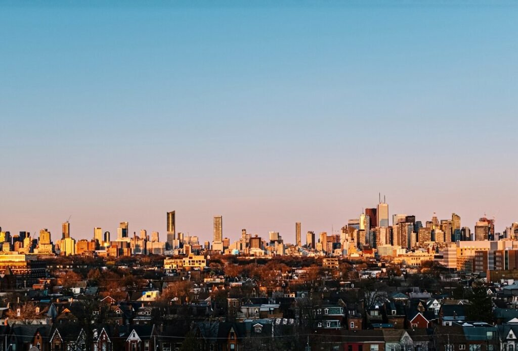 City skyline under blue sky during daytime