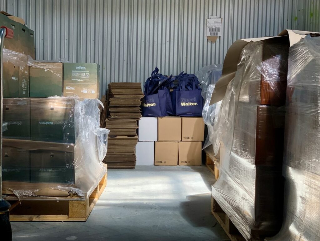 A warehouse filled with lots of boxes and bags