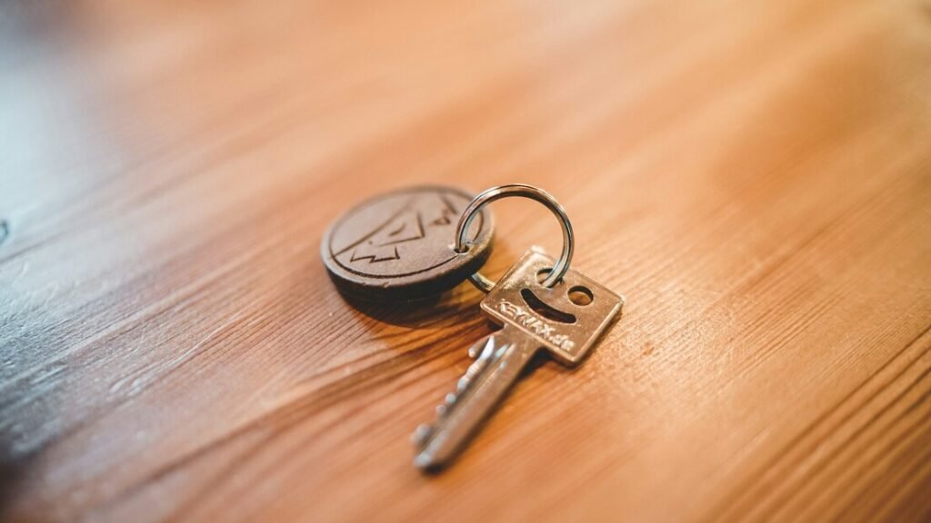 Silver key on tabletop
