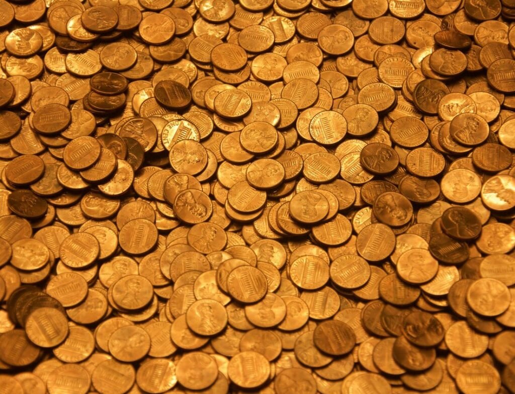 Brown round coins on brown wooden surface
