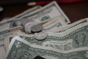 Photo of dollar coins and banknotes