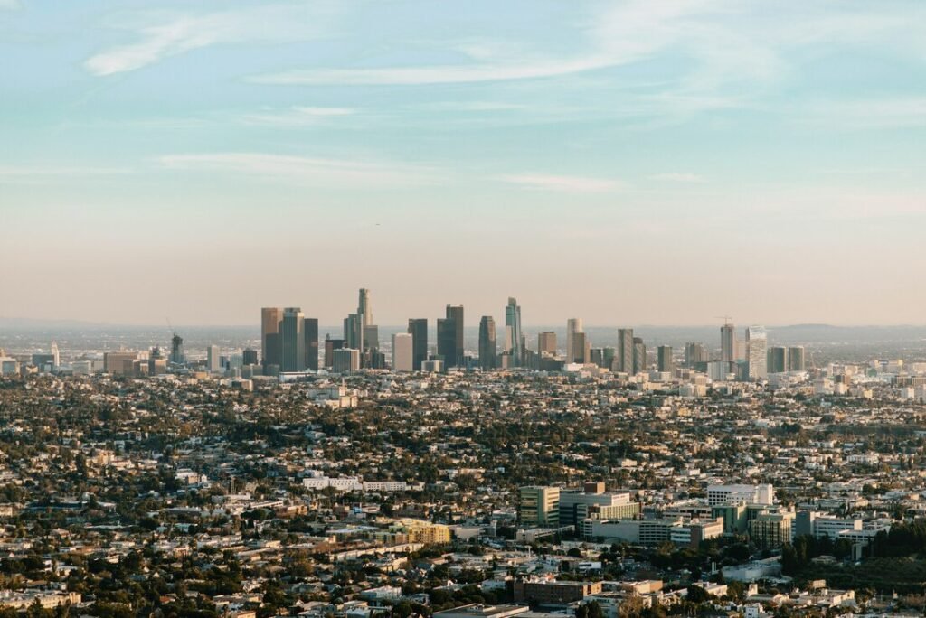 City skyline under blue sky during daytime