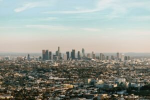 City skyline under blue sky during daytime