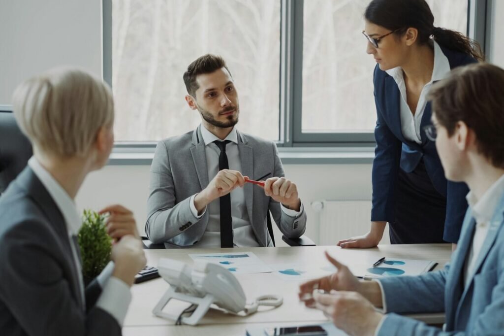 Business professionals collaborating around a conference table